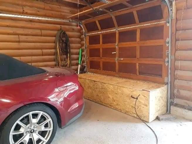 A man built a cat house
